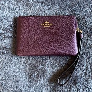 Coach purple wristlet